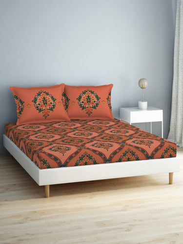 https://cdn.shopify.com/s/files/1/1857/6931/products/7439ec46-19f3-4180-8e84-15cb9263c3f91698474298775-SPACES-Aurum-Peach-Ethnic-Motifs-Pure-Cotton-140-TC-Queen-Be-1.jpg?v=1703244579